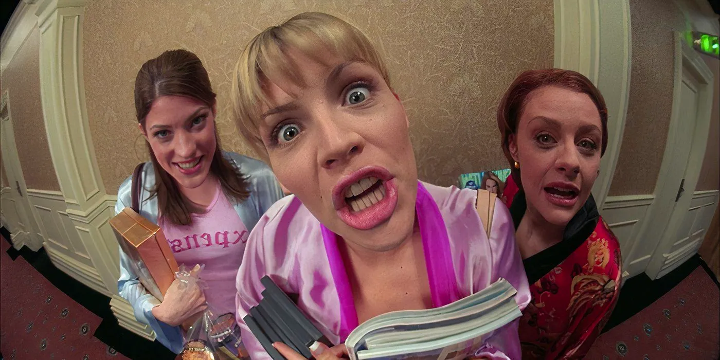 Karen (Busy Philipps), Lisa (Jennifer Carpenter), and Tori (Jessica Cauffiel) looking through a peephole in White Chicks. Image