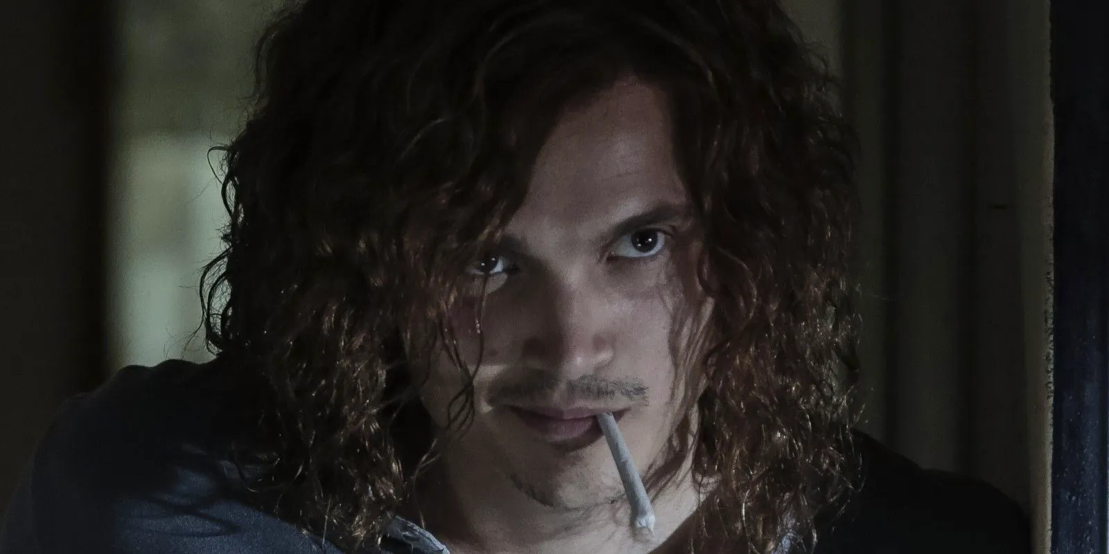 Karl Glusman as Joe B with a cigarette in his month Image