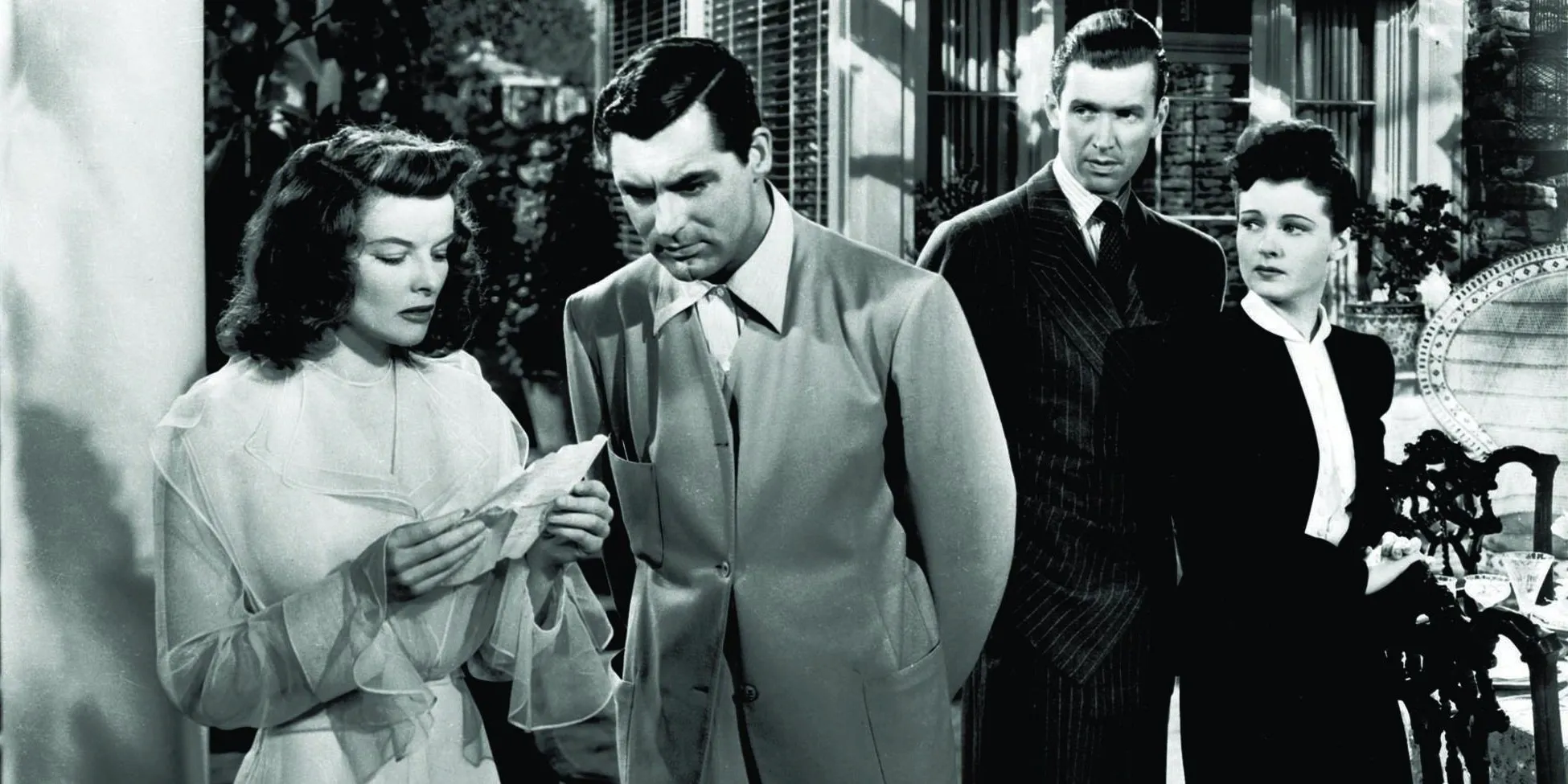 Katharine Hepburn and her suitors James Stewart and Carey Grant in The Philadelphia Story Image