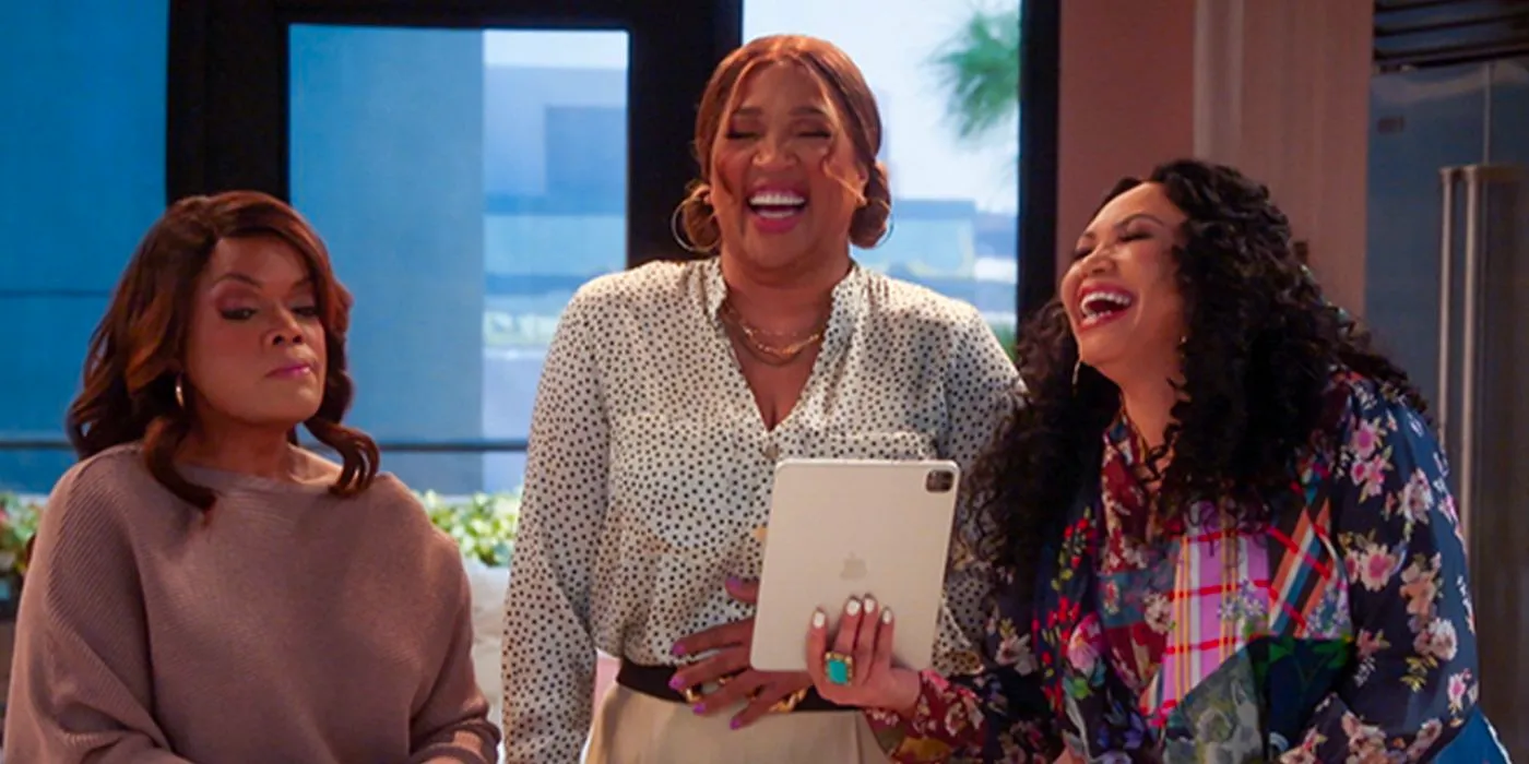 Keisha (Tisha Campbell) and Bernadette (Kym Whitley) laughing at Angela Martin (Yvette Nicole Brown) who looks annoyed in Act Your Age. Image