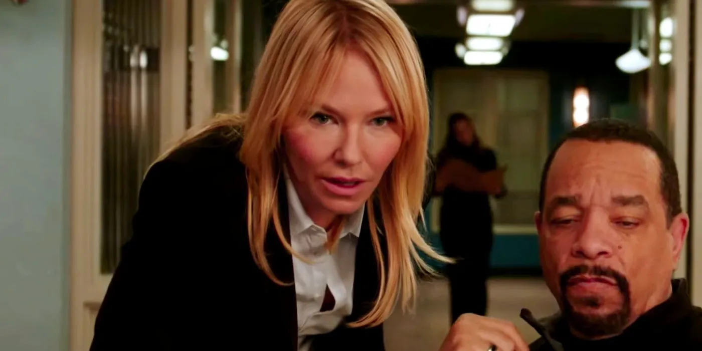 Kelli Giddish as Amanda Rollins standing over Fin (Ice-T) in Law and Order SVU Image