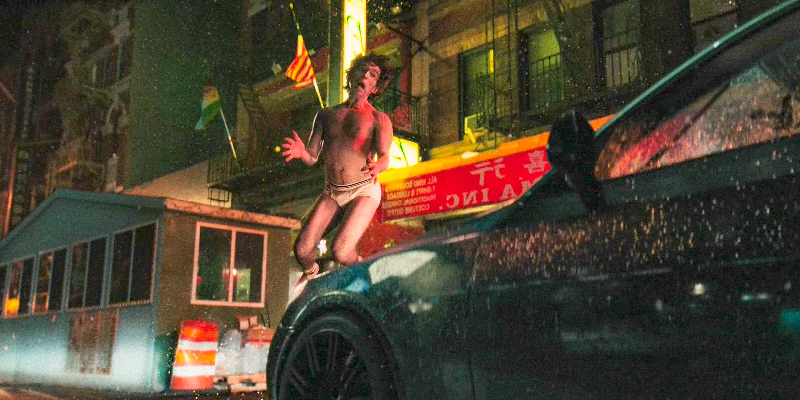 Kid (Austin Abrams) in his underwear being hit by a car in WOLFS Image