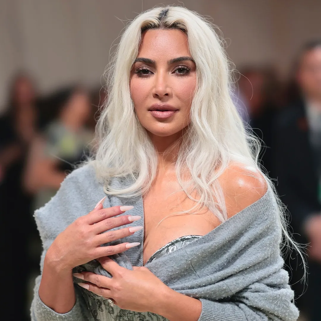 Kim Kardashian Is Unrecognizable in Skin-Tight Albino Alligator Halloween Costume - E! Online Image