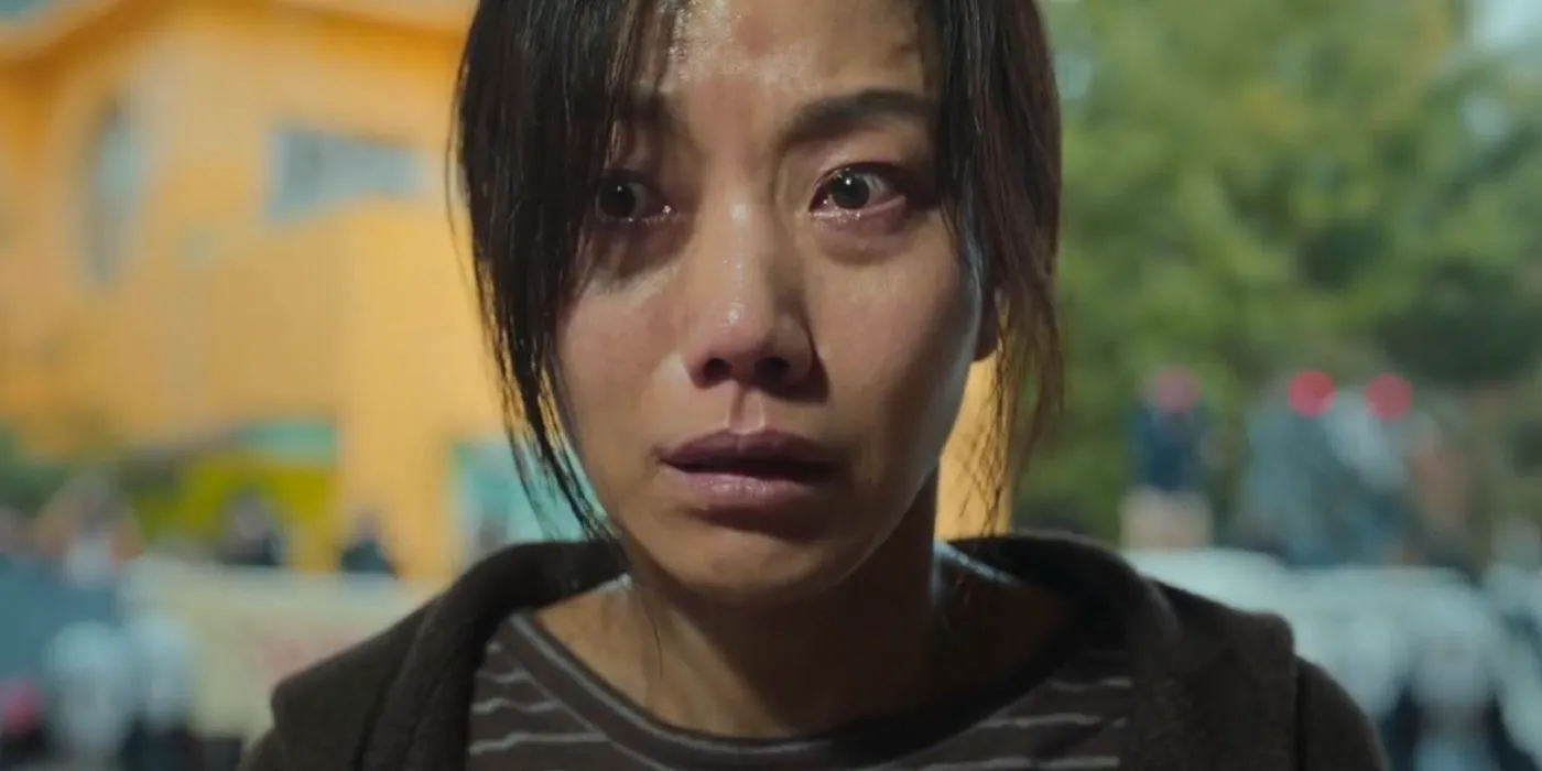 Kim Shin-rok crying and looking scared in Hellbound Image