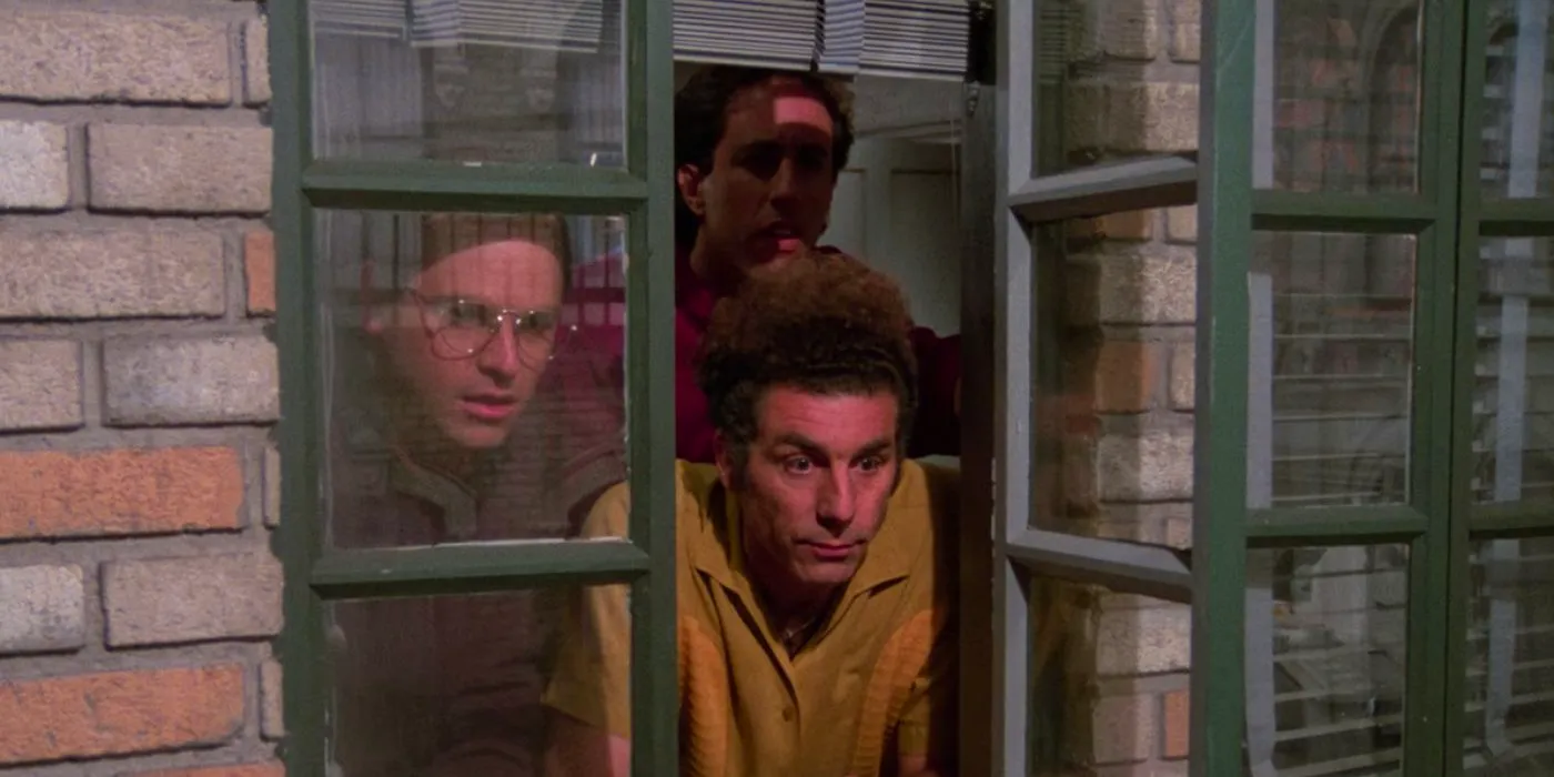 Kramer, Jerry, and George looking out the window in Seinfeld Image