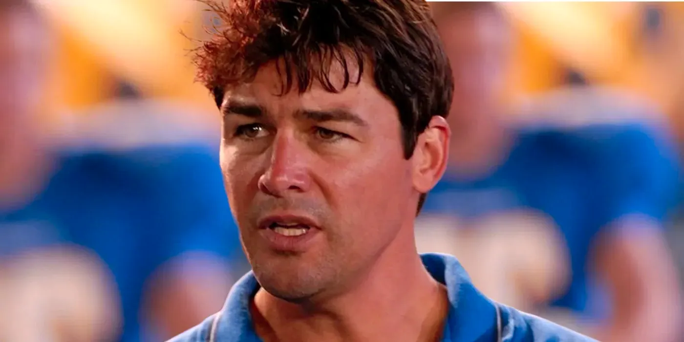 Kyle Chandler as Coach Taylor speaking among football players in Friday Night Lights Image