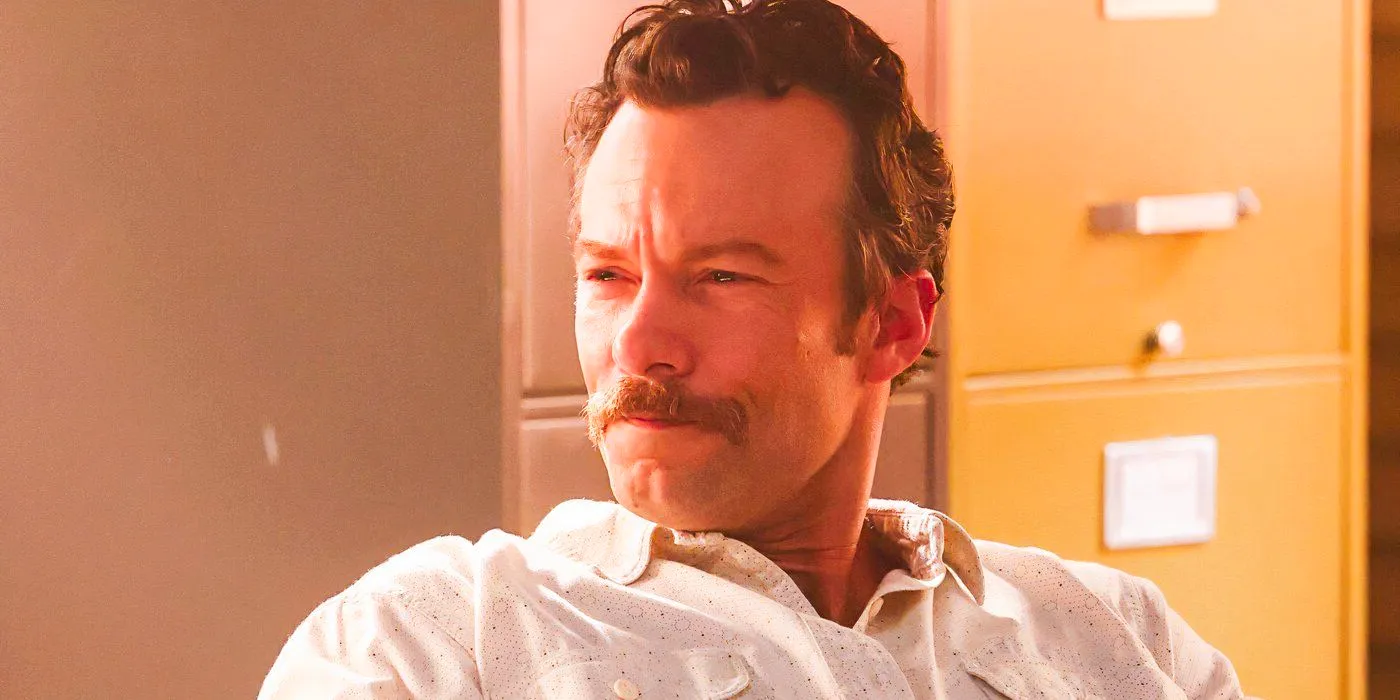 Kyle Schmid as Mike Franks with narrowed eyes in NCIS: Origins Image