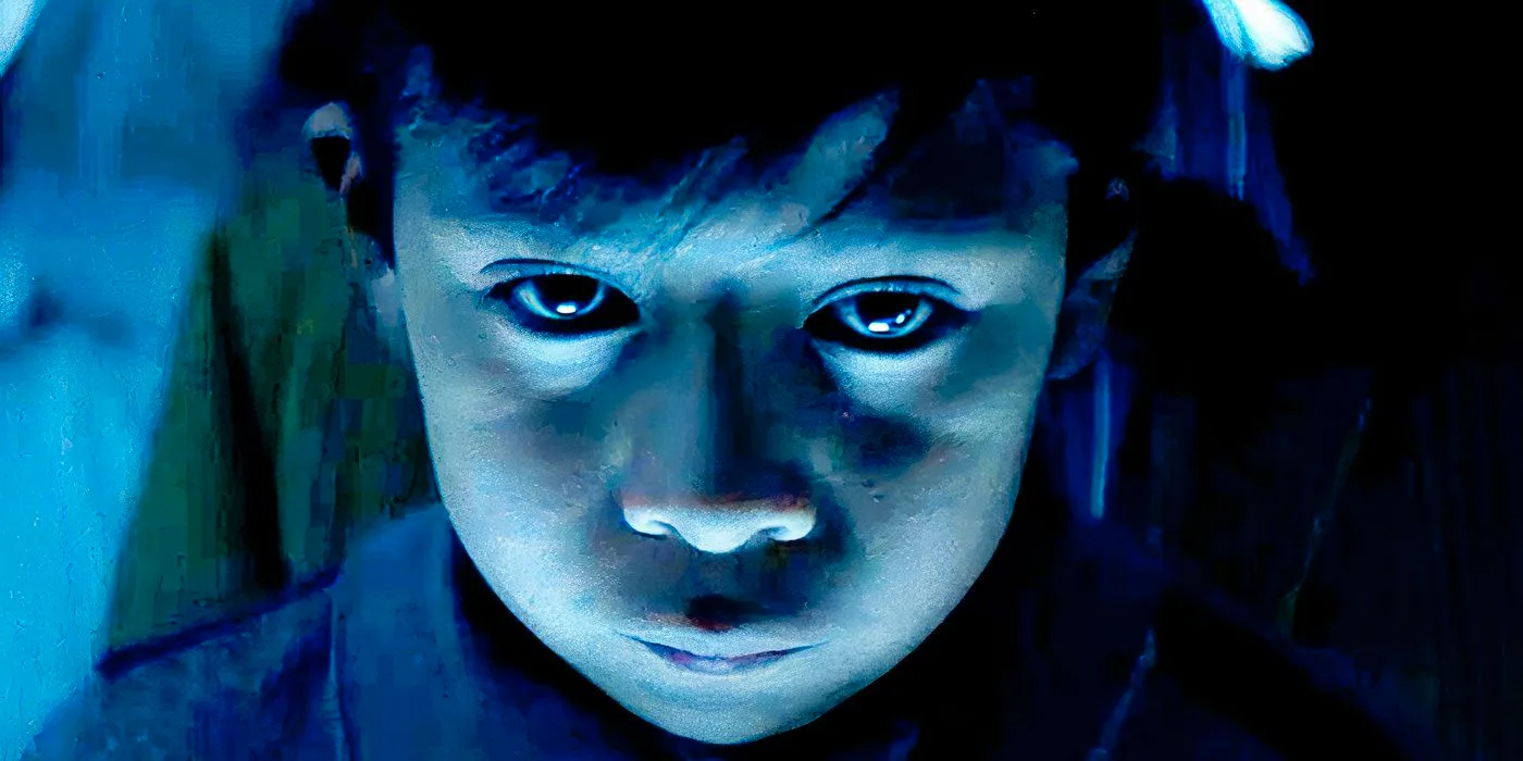 La Llorona - Little child upclose face in the dark lit by blue light looking nervous  Image