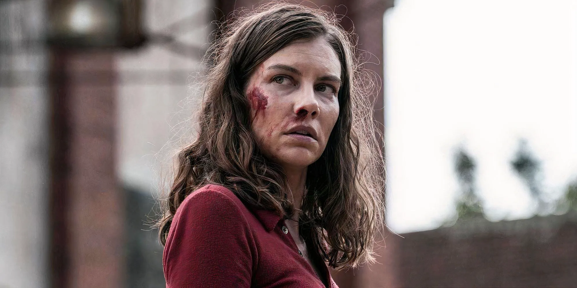 Lauren Cohan as Maggie Rhee with blood on her face in The Walking Dead: Dead City Image