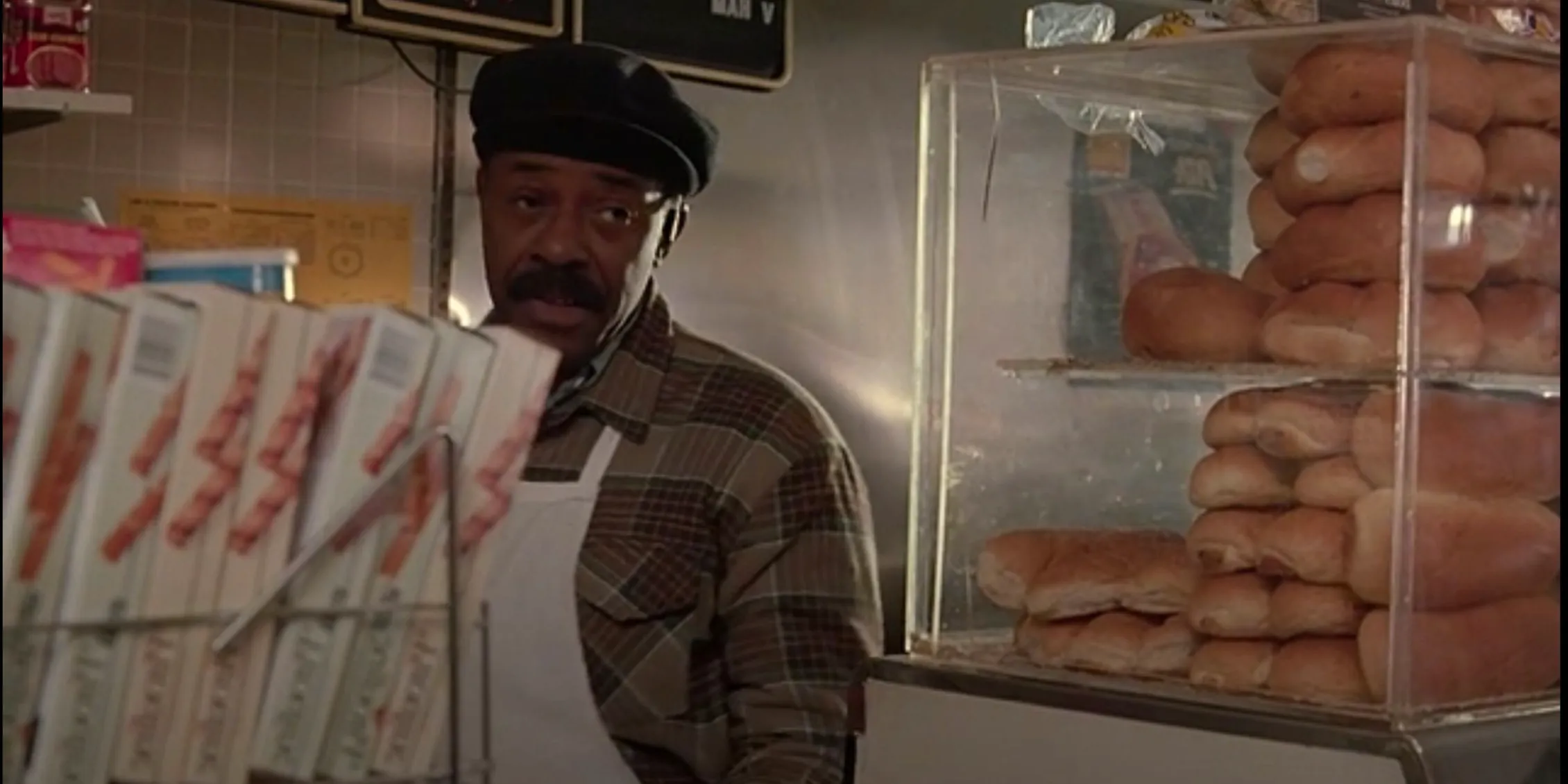 Law & Order Ed Wheeler as David, standing by freshly baked bread Image