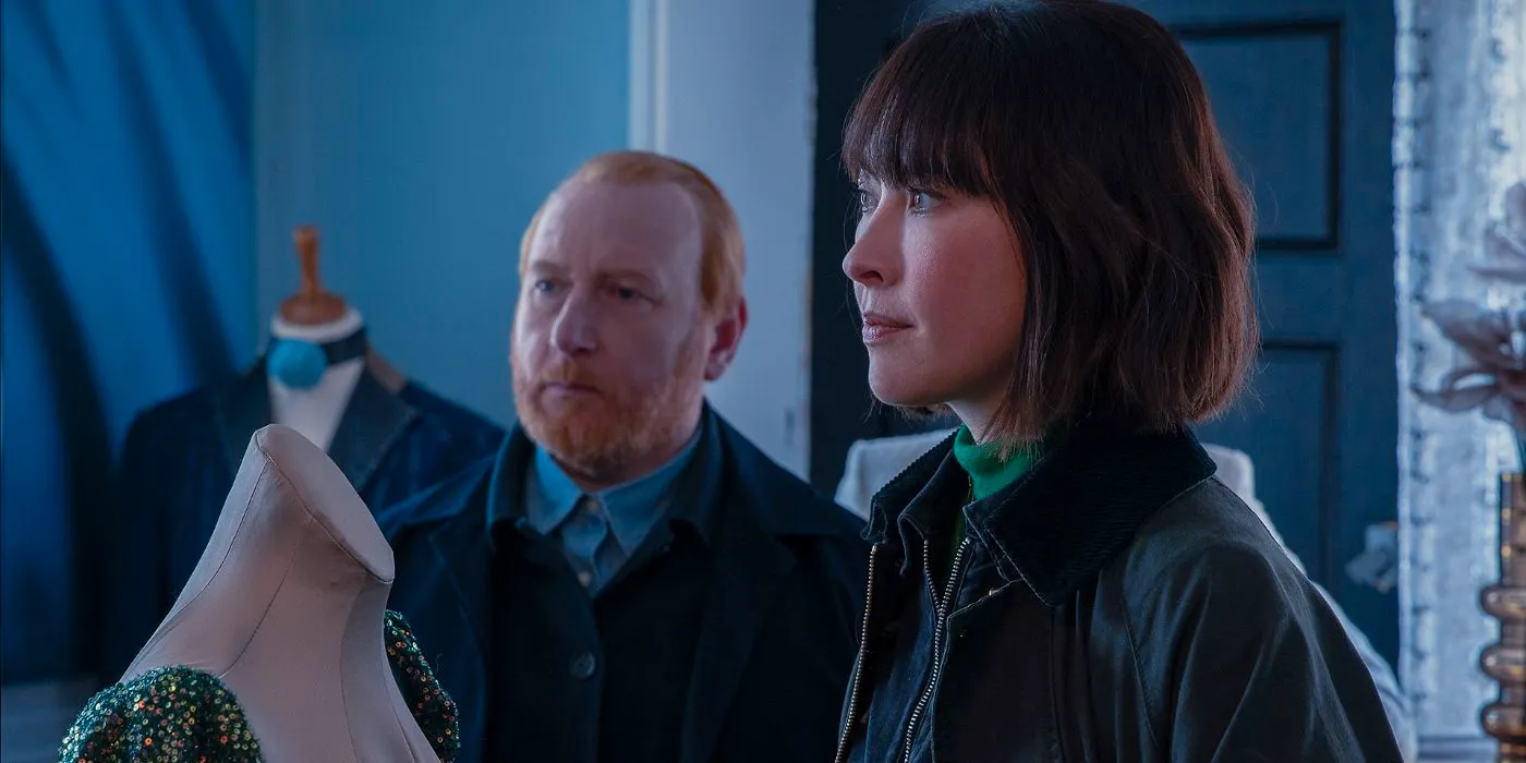 Layla (Vanessa Emme) and Max (Adrian Scarborough) in a dress shop in The Chelsea Detective. Image