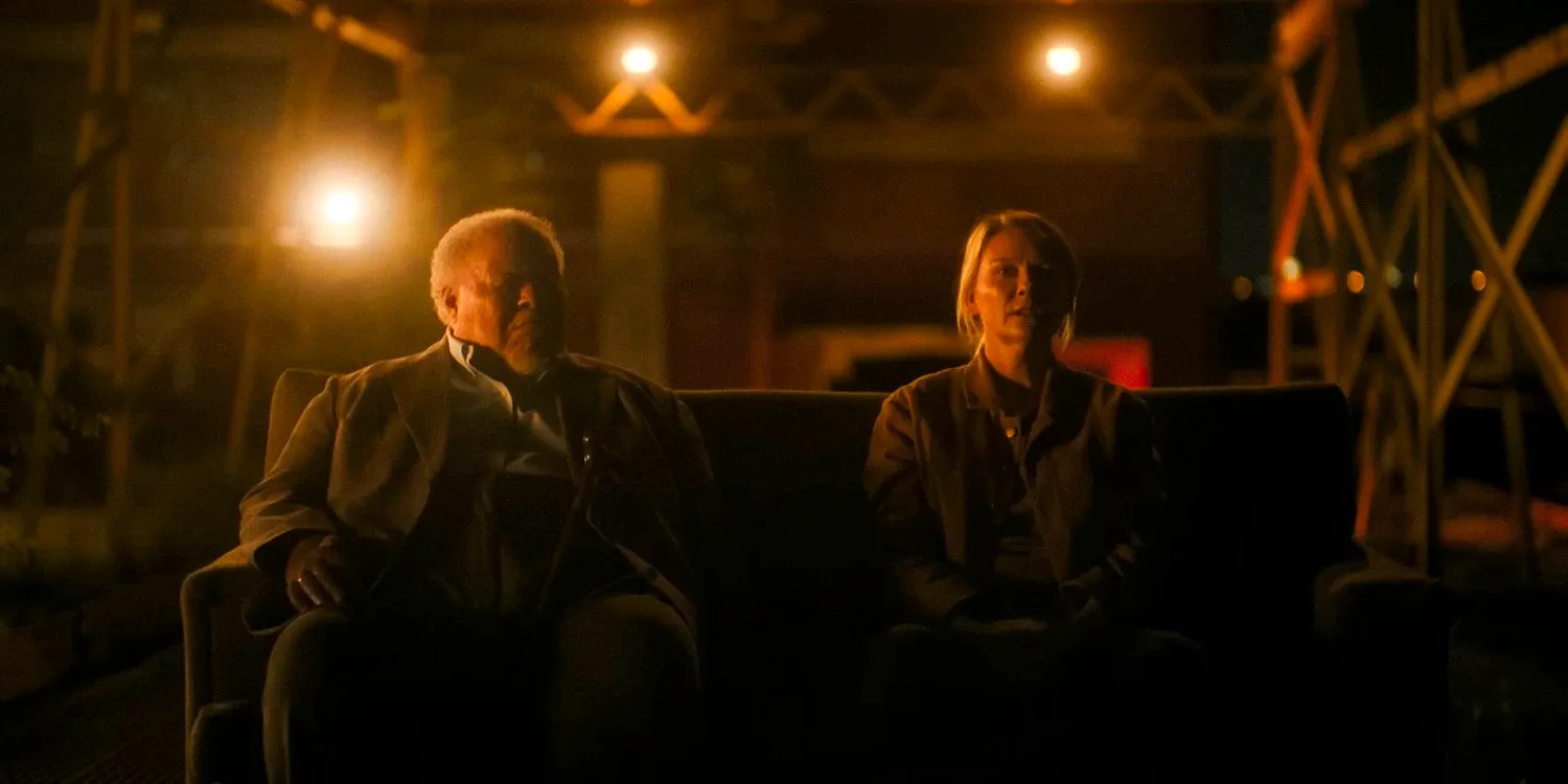 Lee and Sammy in Civil War. They are sitting on a sofa, looking very pensive. It is nighttime. Image