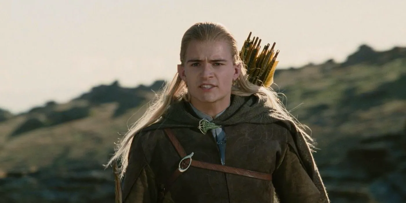 Legolas looks out at the land in Lord of the Rings: The Two Towers Image