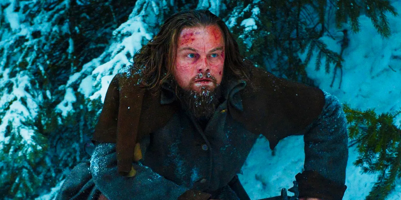 Leonardo DiCaprio among the snowy trees in The Revenant Image