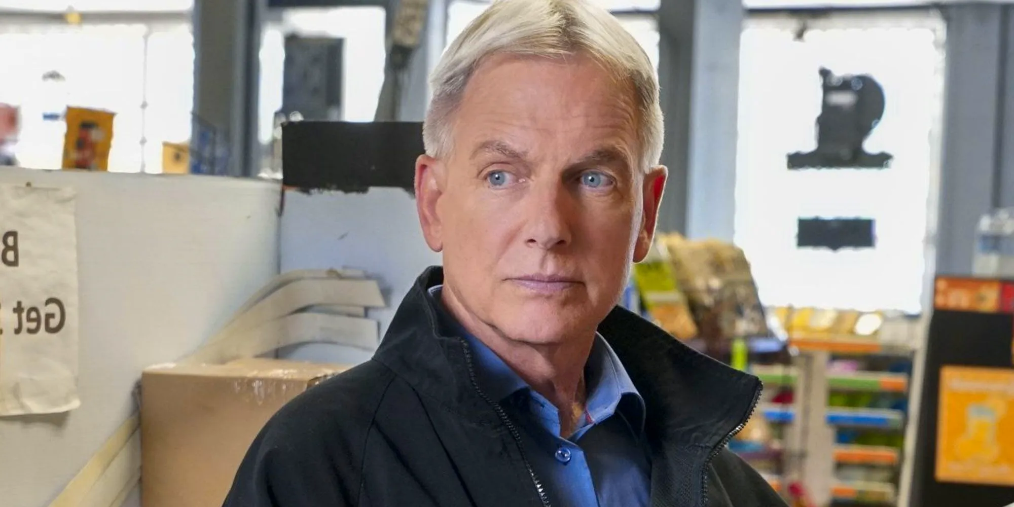 Leroy Jethro Gibbs looks serious in a convenience store in NCIS. Image