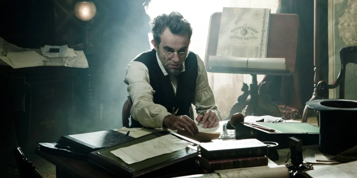 Lincoln at his desk surrounded by papers in Lincoln Image