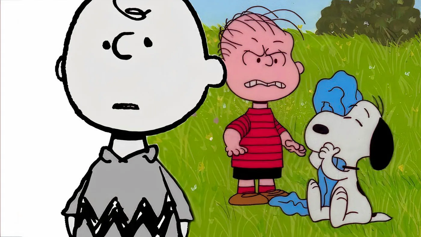 Linus mad at Snoopy with Charlie Brown in the foreground. Image