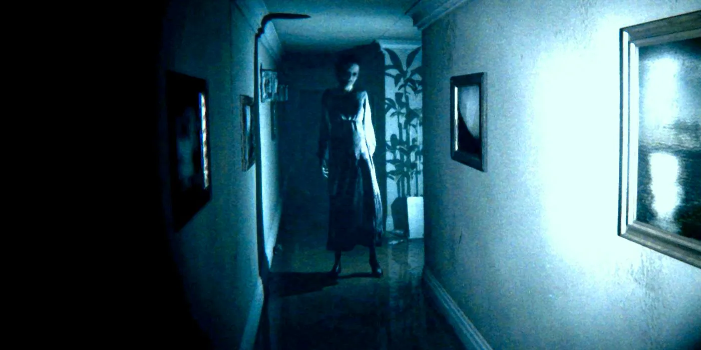 Lisa from Silent Hills' P.T. standing in an empty hallway. Image