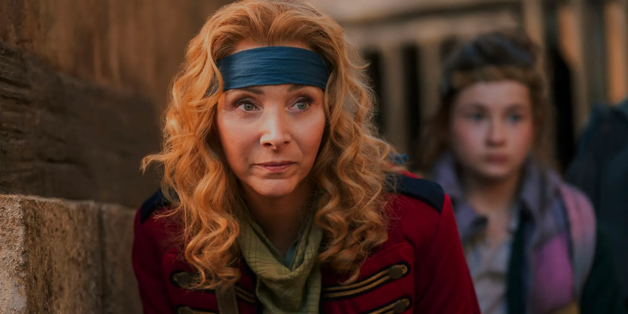 Lisa Kudrow As Penelope looking stern In Time Bandits 2024. Image