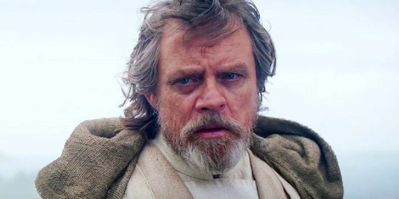 Luke Skywalker looks on in Star Wars The Force Awakens Image