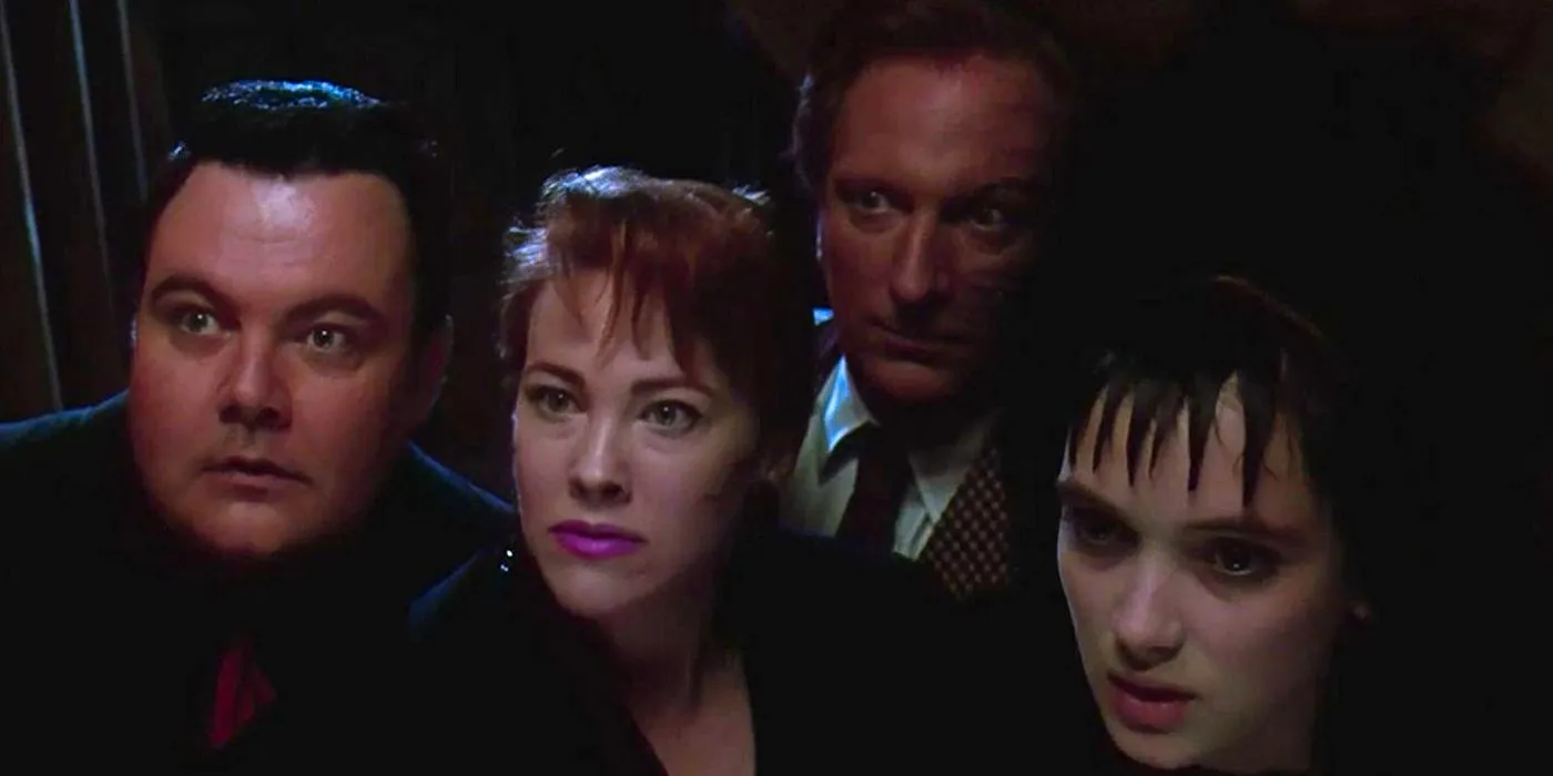 Lydia, Charles, Delia, and Otho looking at the attic in Beetlejuice Image