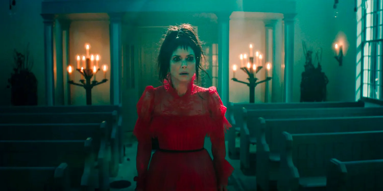 Lydia Deetz (Winona Ryder) in the red wedding dress in Beetlejuice 2 Image