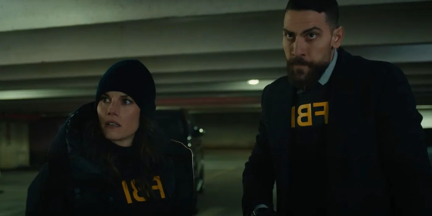 Maggie (Missy Peregrym) and OA (Zeeko Zaki) with intense looks in FBI season 6 Image