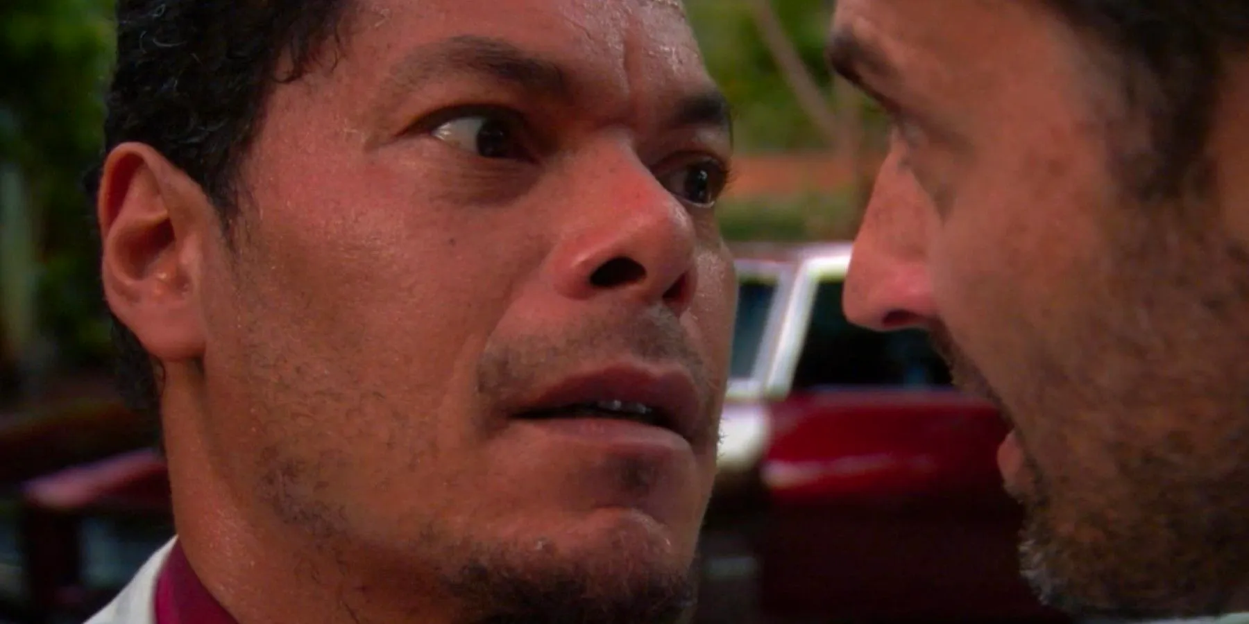 Marcus Chong looking scared in Burn Notice Image