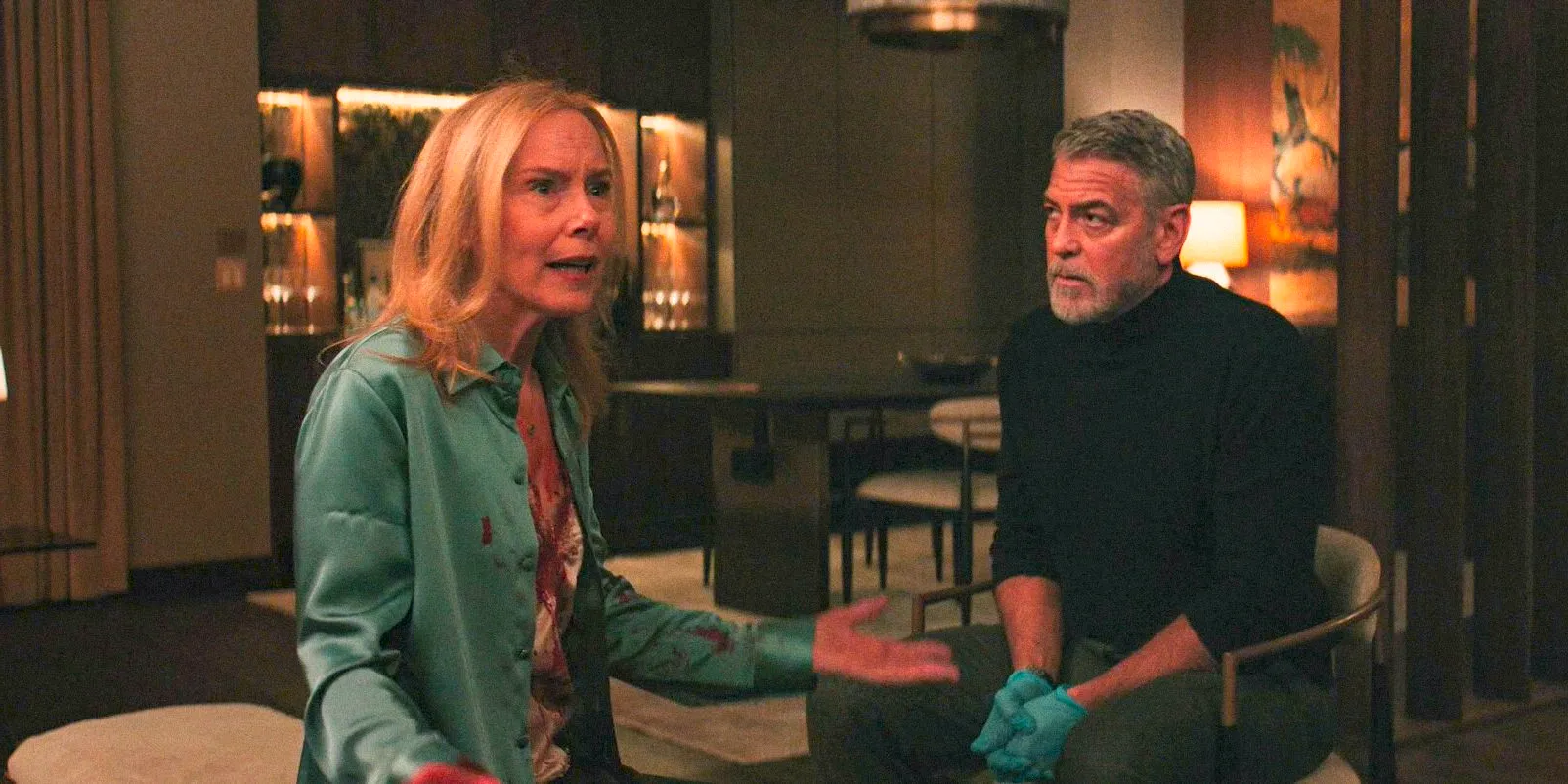 Margaret's Man (George Clooney) Interrogating Margaret (Amy Ryan) Who Looks Angry in WOLFS Image