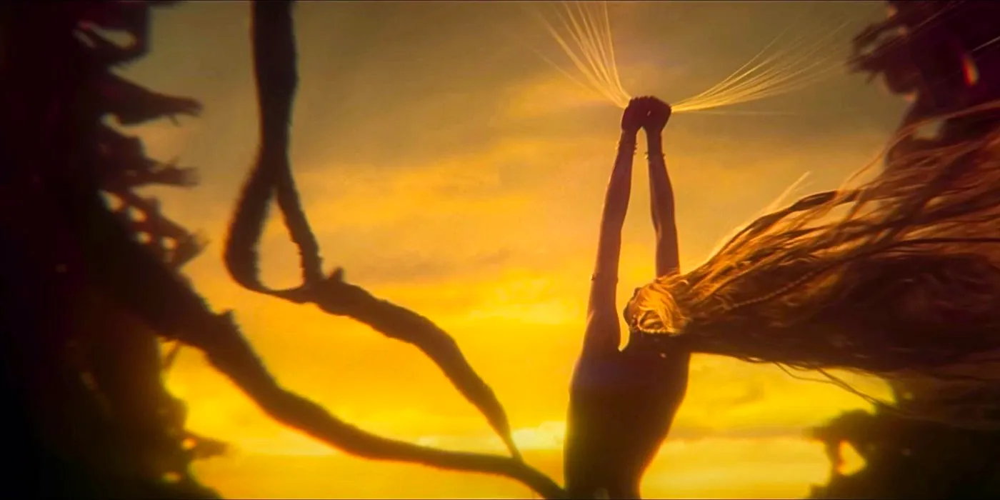 Marika holding golden strands above her head in Shadow of the Erdtree Image