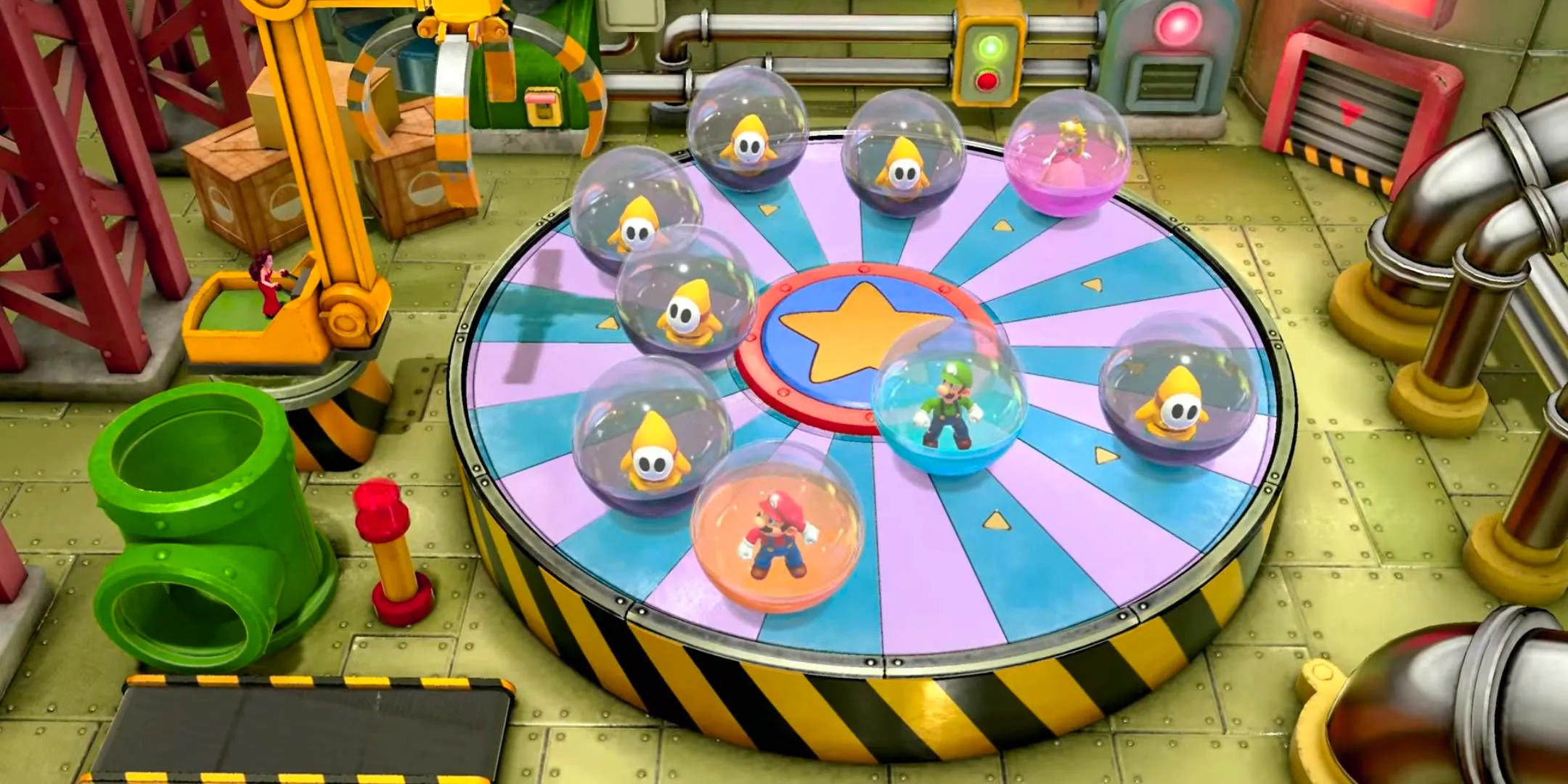 Mario, Luigi, and Peach rolling around in balls on a spinning wheel while Pauline tries to grab them using a crane in the Mario Party Jamboree Blame minigame It On The Crane. Image