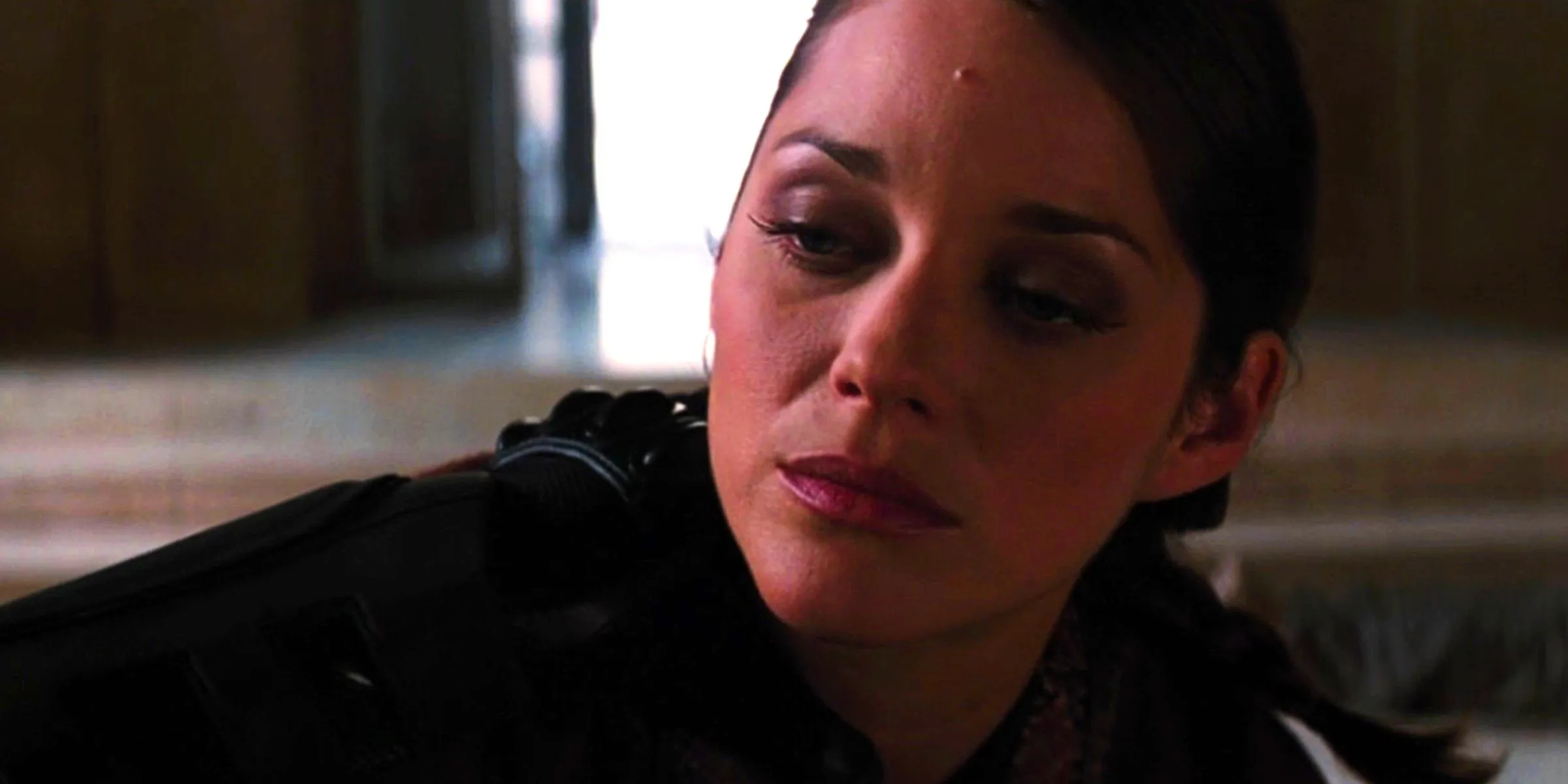 Marion Cotillard as Miranda Tate in The Dark Knight Rises looking offscreen Image