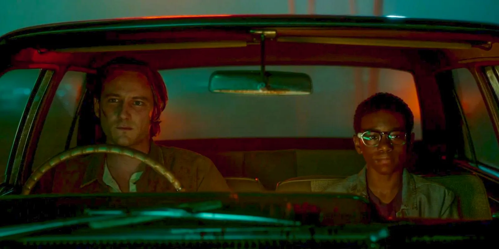 Mark Petrie (Jordan Preston Carter) and Ben Mears (Lewis Pullman) leave Jerusalem's Lot in a car in Salem's Lot (2024) Image