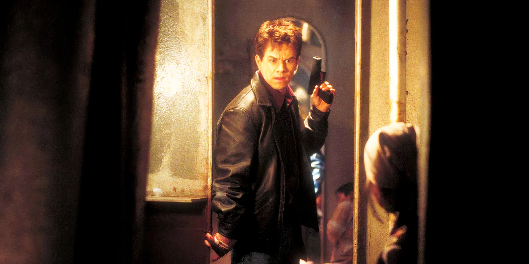 Mark Wahlberg holding a pistol in The Corruptor Image