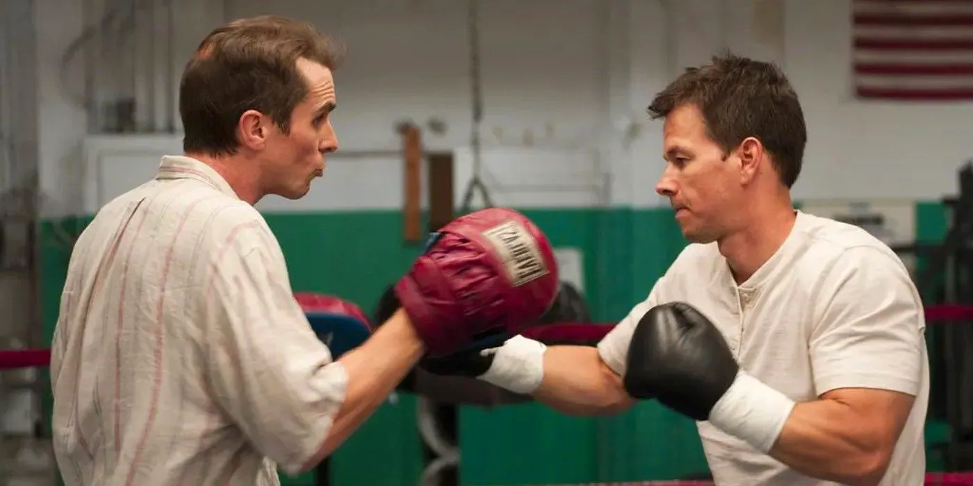 Mark Wahlberg practices boxing with Christian Bale in The Fighter. Image