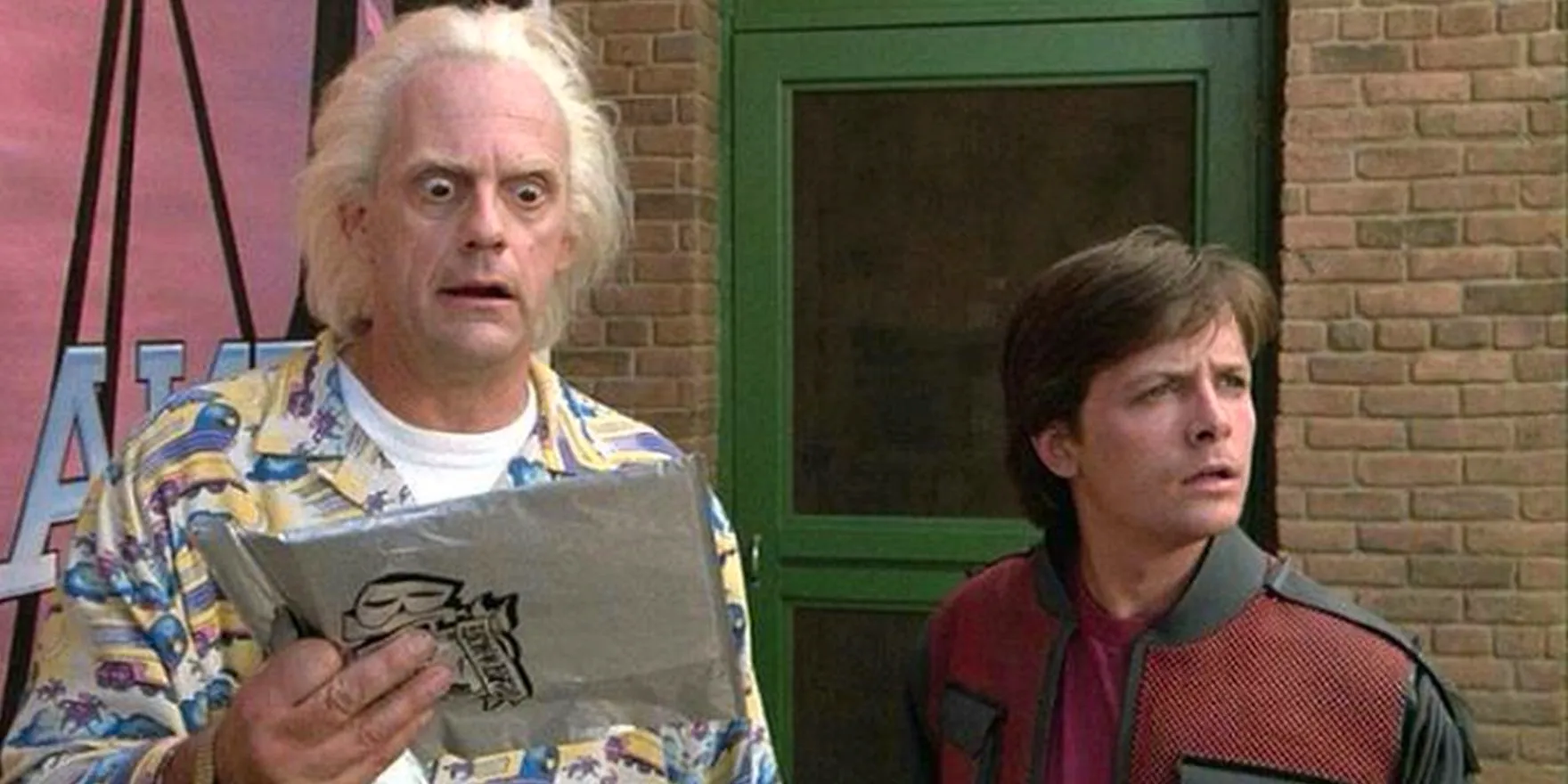 Marty looking off-screen as Doc finds the almanac in Back to the Future Part II Image