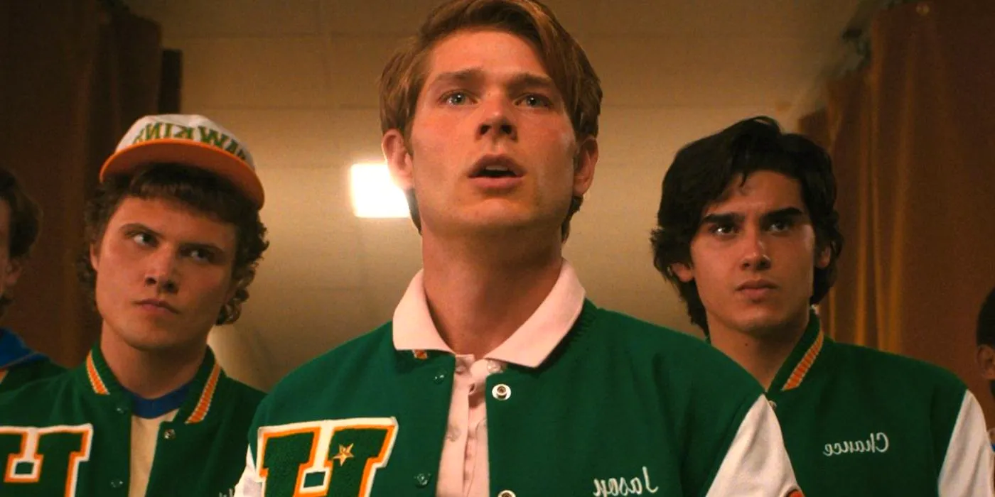 Mason Dye as Jason Carver next to other basketball team members in Stranger Things Image