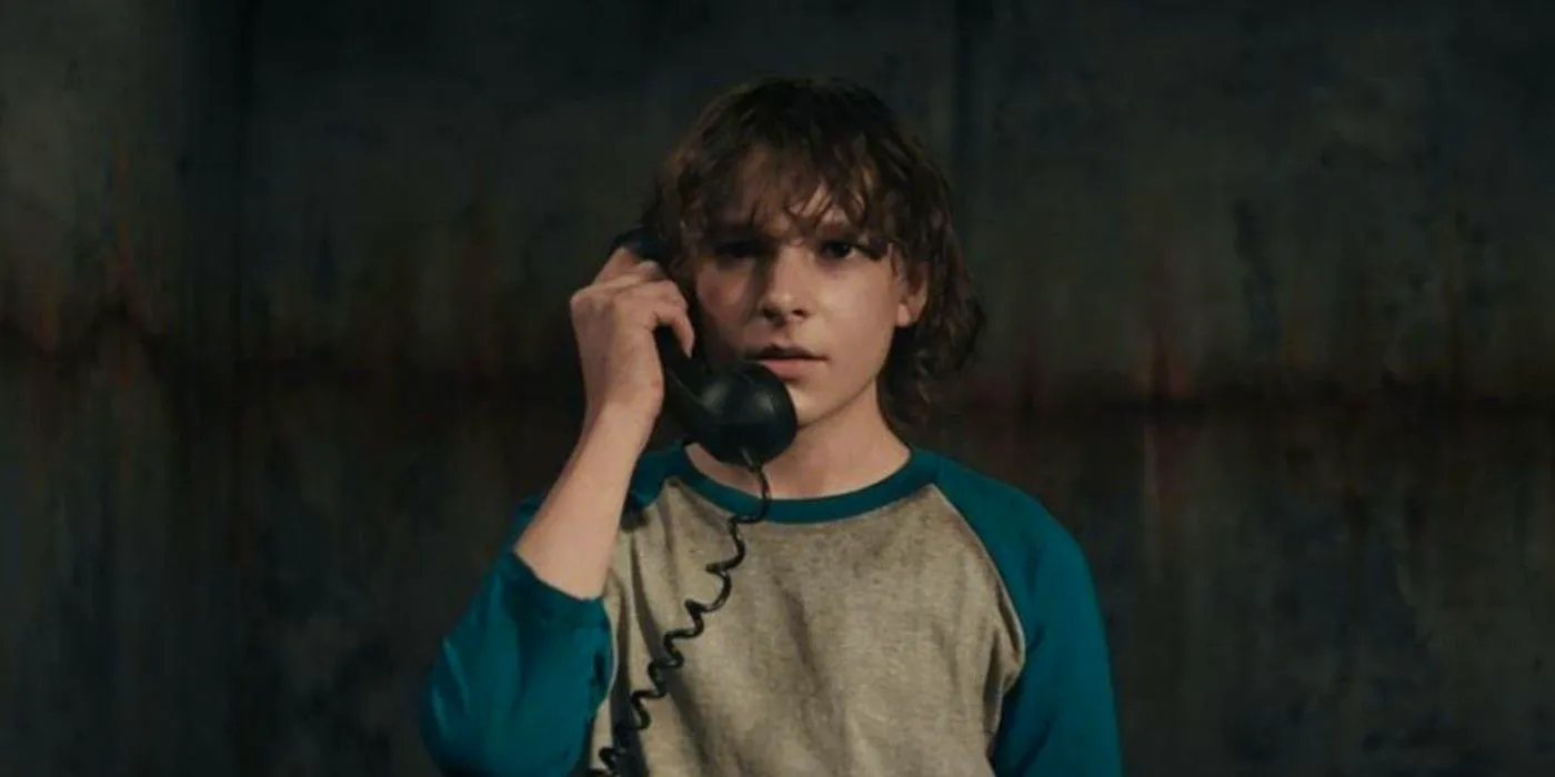 Mason Thames as Finney on the phone in The Black Phone Image