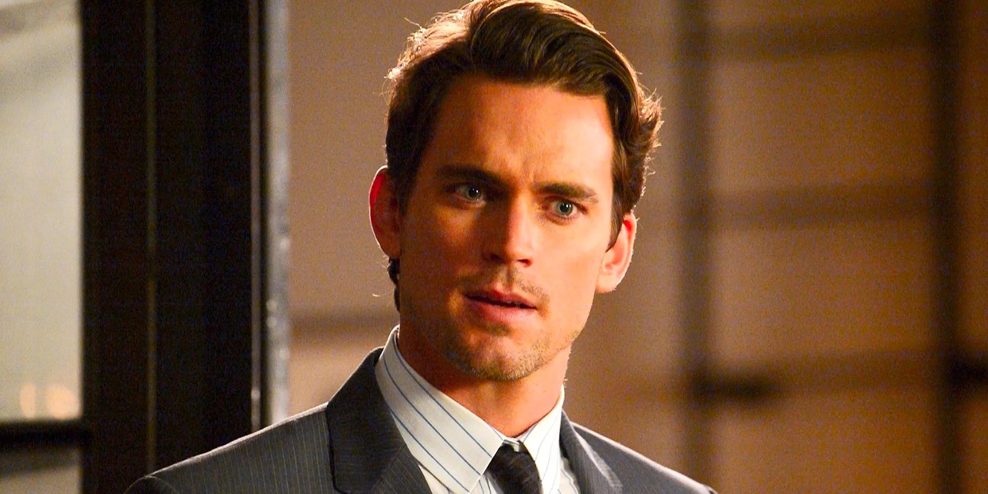 Matt Bomer wearing a suit in White Collar Image