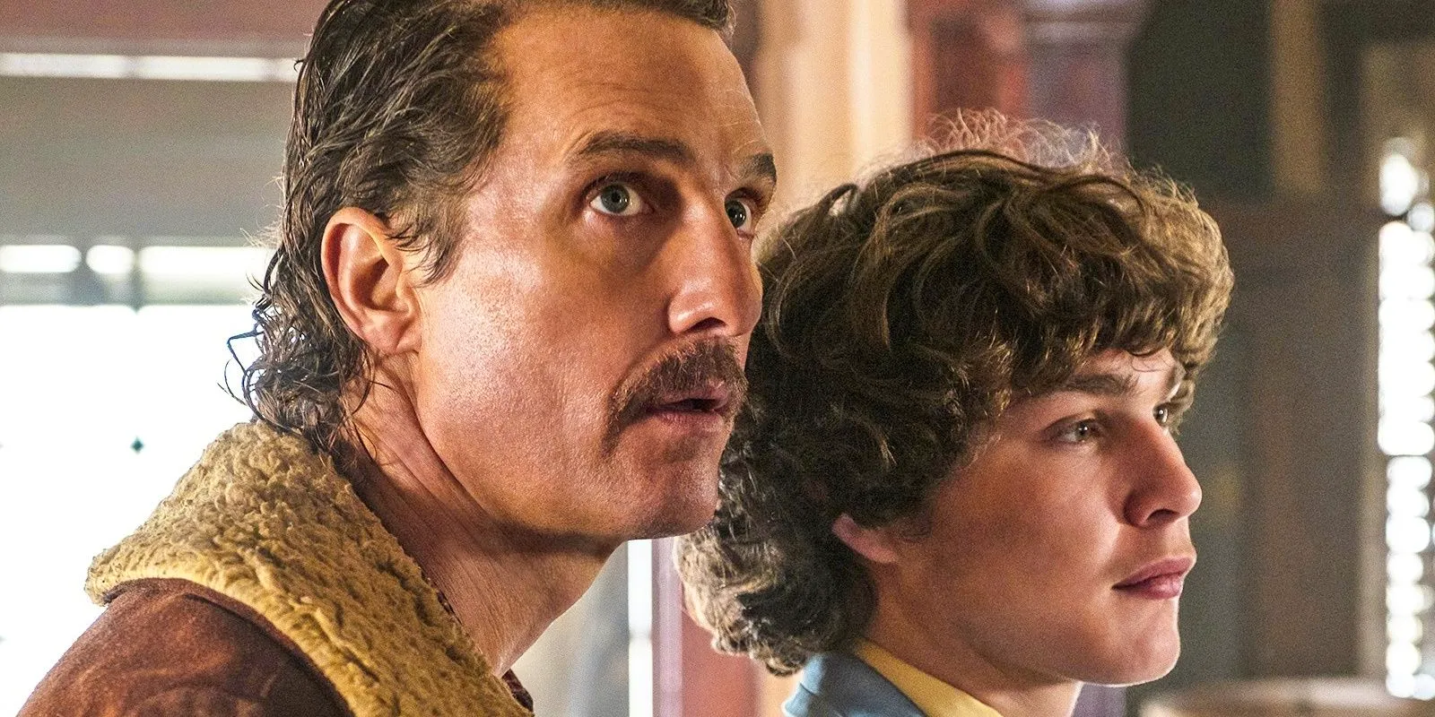 Matthew McConaughey as Richard Wershe Sr. and Richie Merritt as Richard Wershe Jr. standing together in White Boy Rick. Image