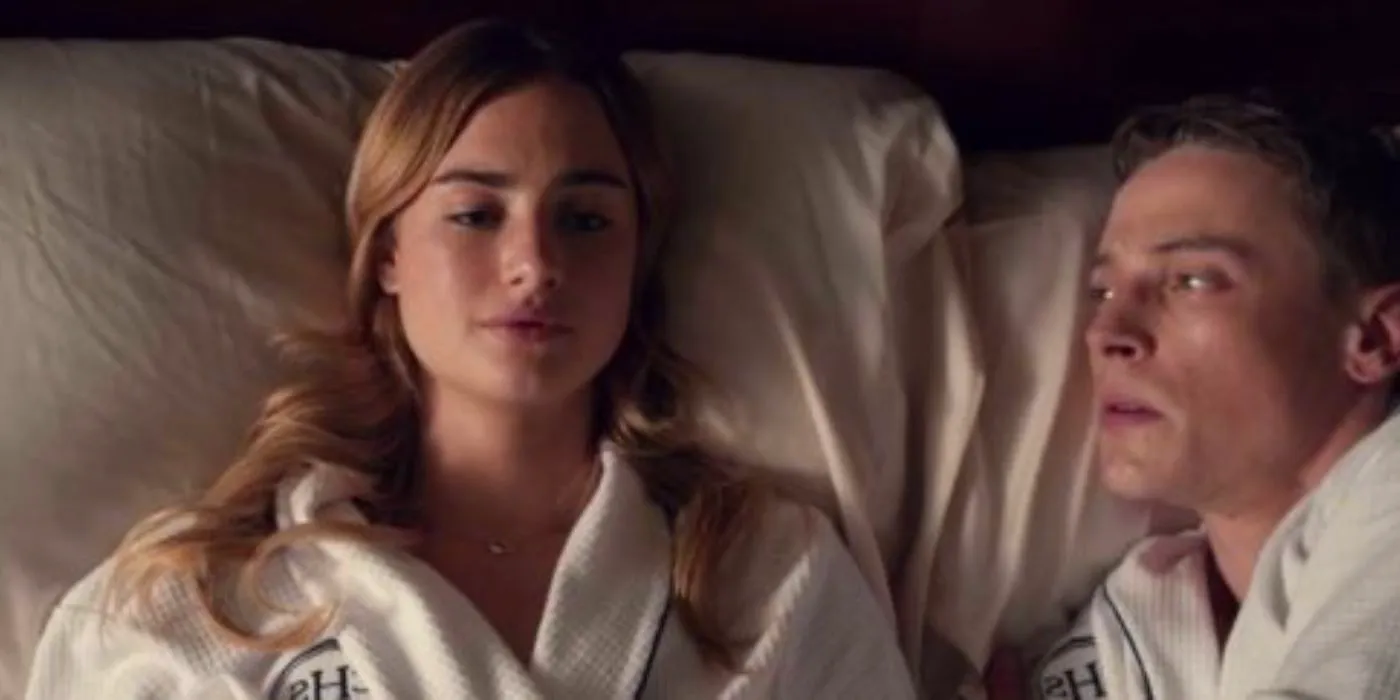 Max and Lucy lying in bed in robes in Tell Me Lies Image