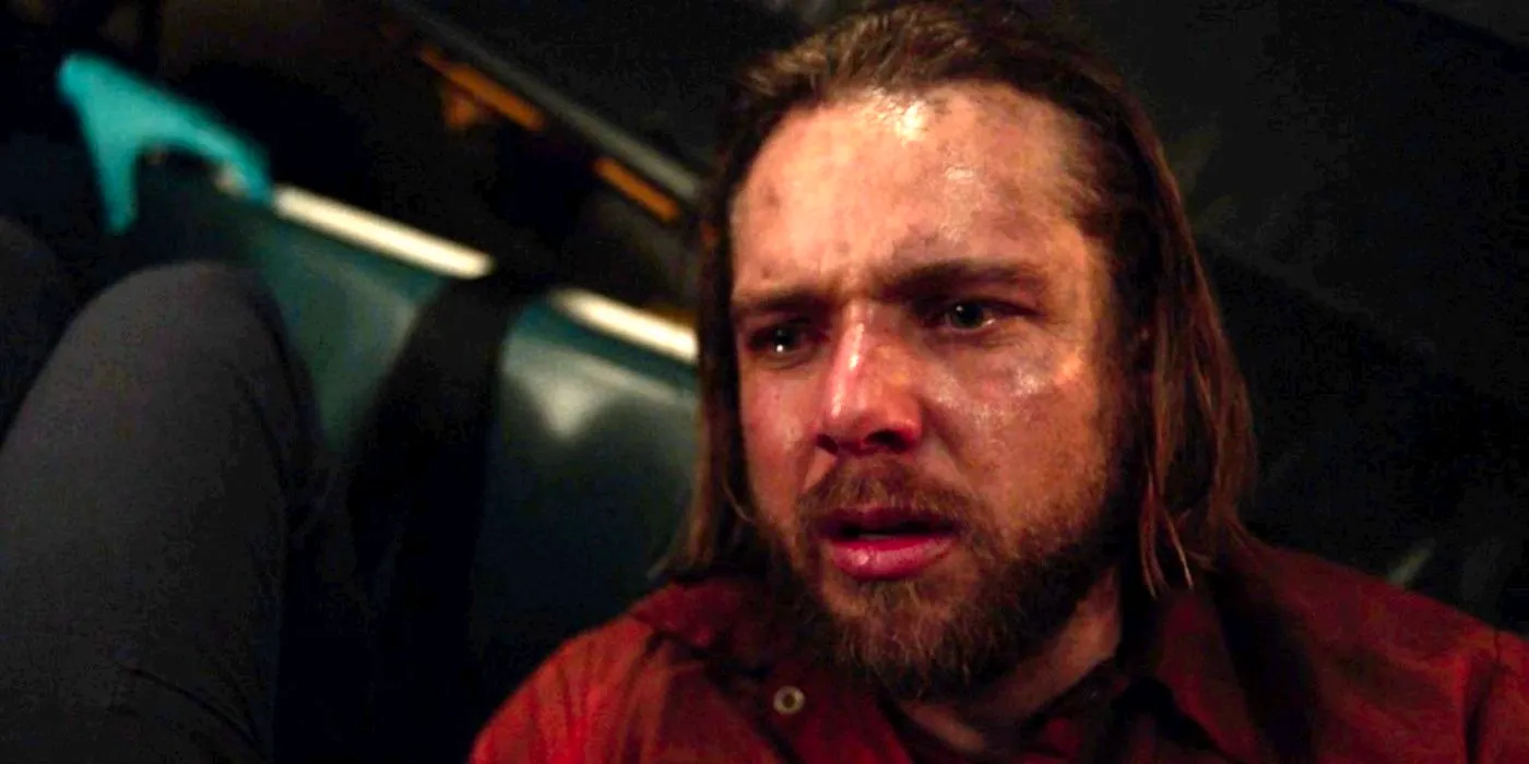 Max Thieriot crying as Bode Donovan in Fire Country season 2 episode 5 Image