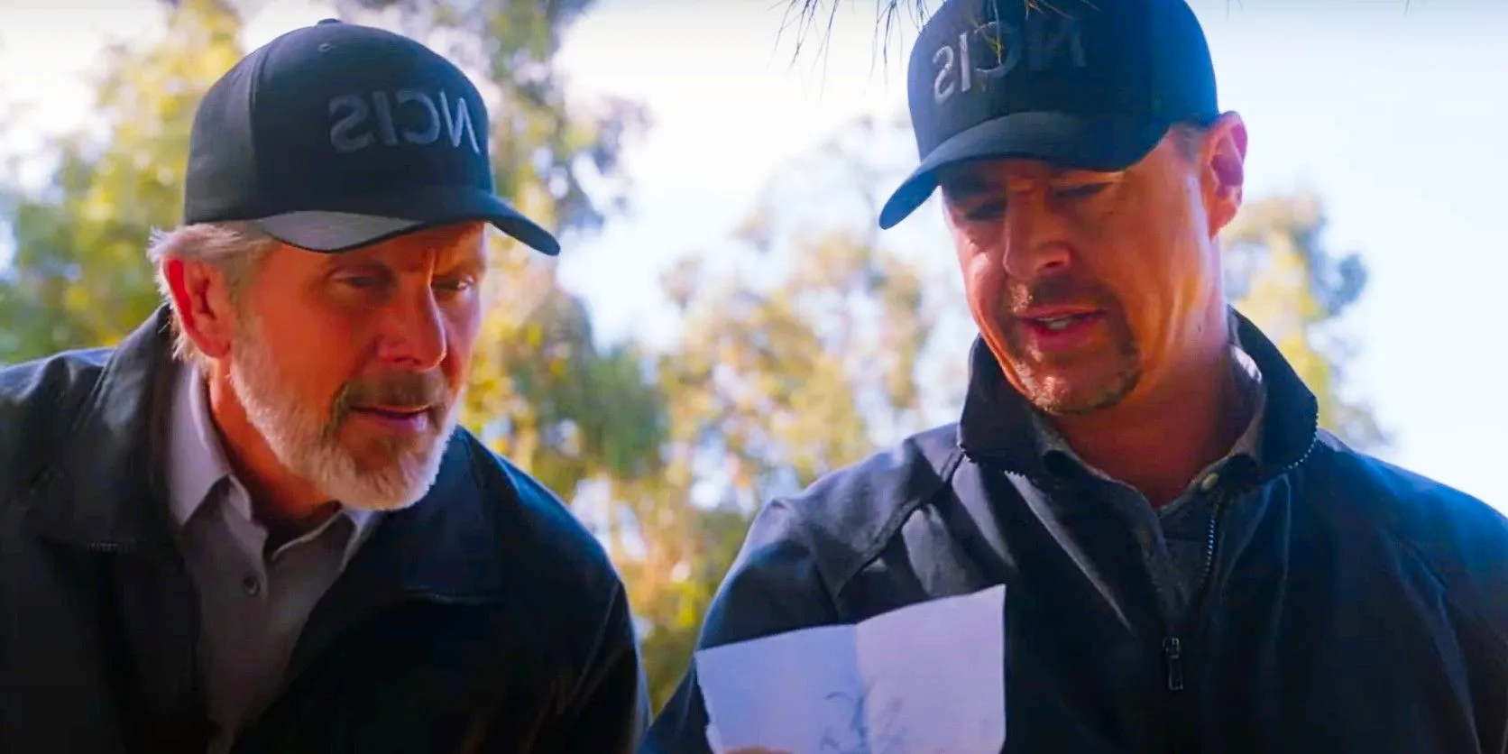 McGee and Parker study a piece of paper in NCIS season 22 Image