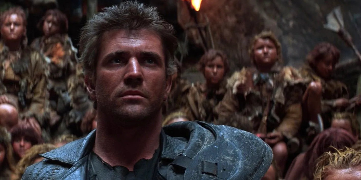 Mel Gibson as Max Surrounded by Children in Mad Max Beyond the Thunderdome Image