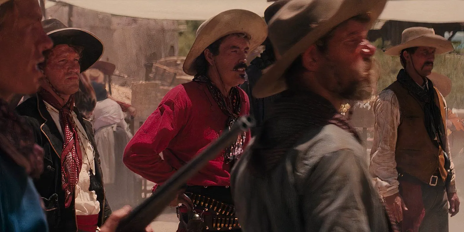 Members of the Cowboys about to shoot up the Mexican wedding in Tombstone Image