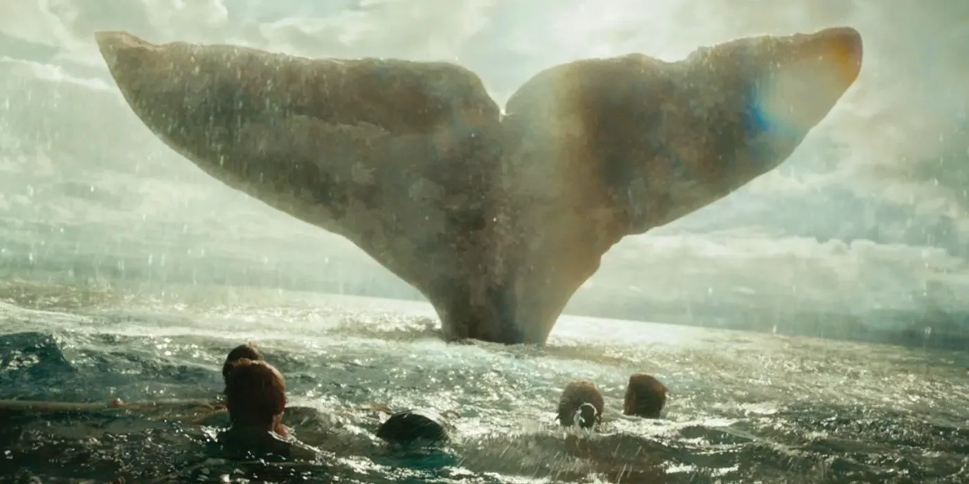 Men in the Water Gazing at the Giant Tail of a Whale in In the Heart of the Sea Image