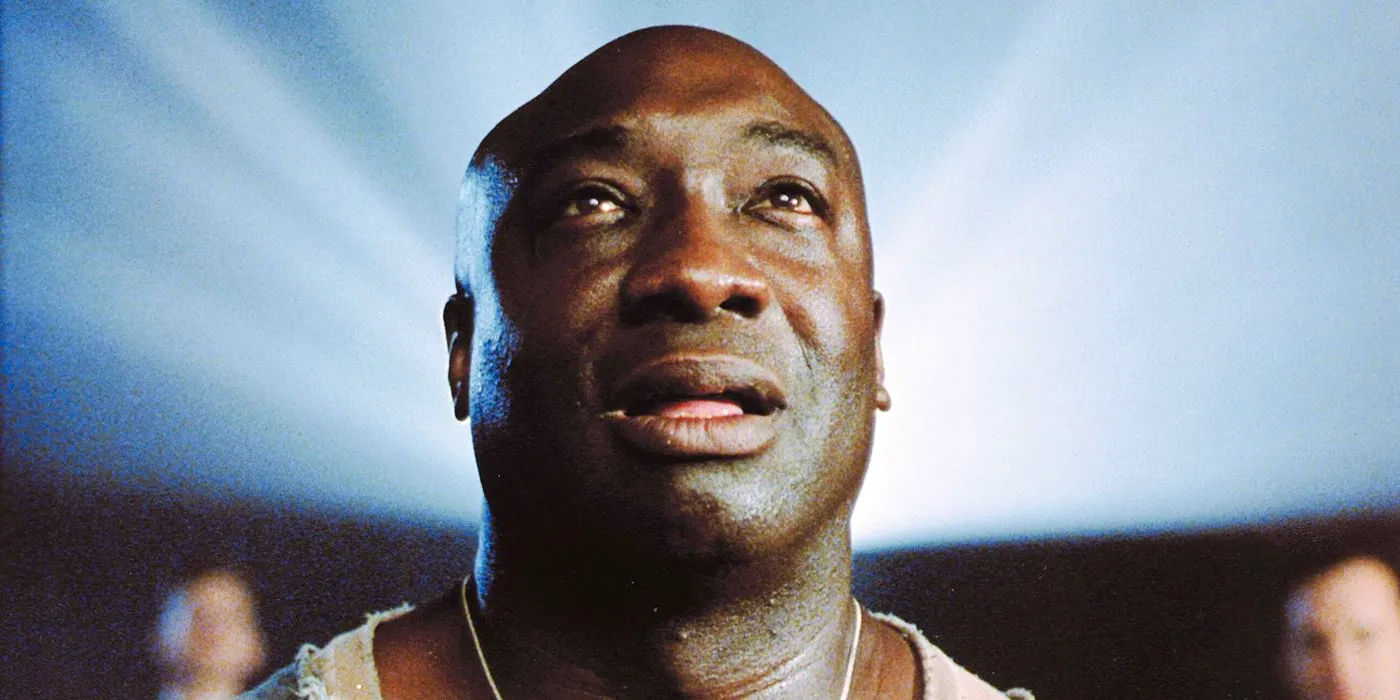 Michael Clarke Duncan as John Coffey fascinated in a movie theater in The Green Mile Image