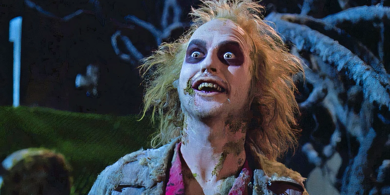 Michael Keaton looking surprised as Betelgeuse in Beetlejuice Image