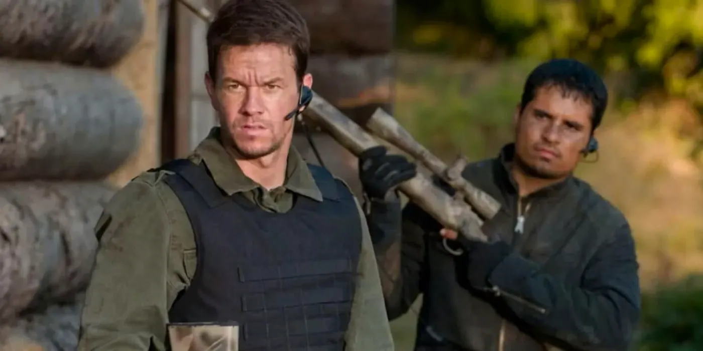 Michael Pena holds a firearm and Mark Wahlberg stares ahead in Shooter (2007) Image