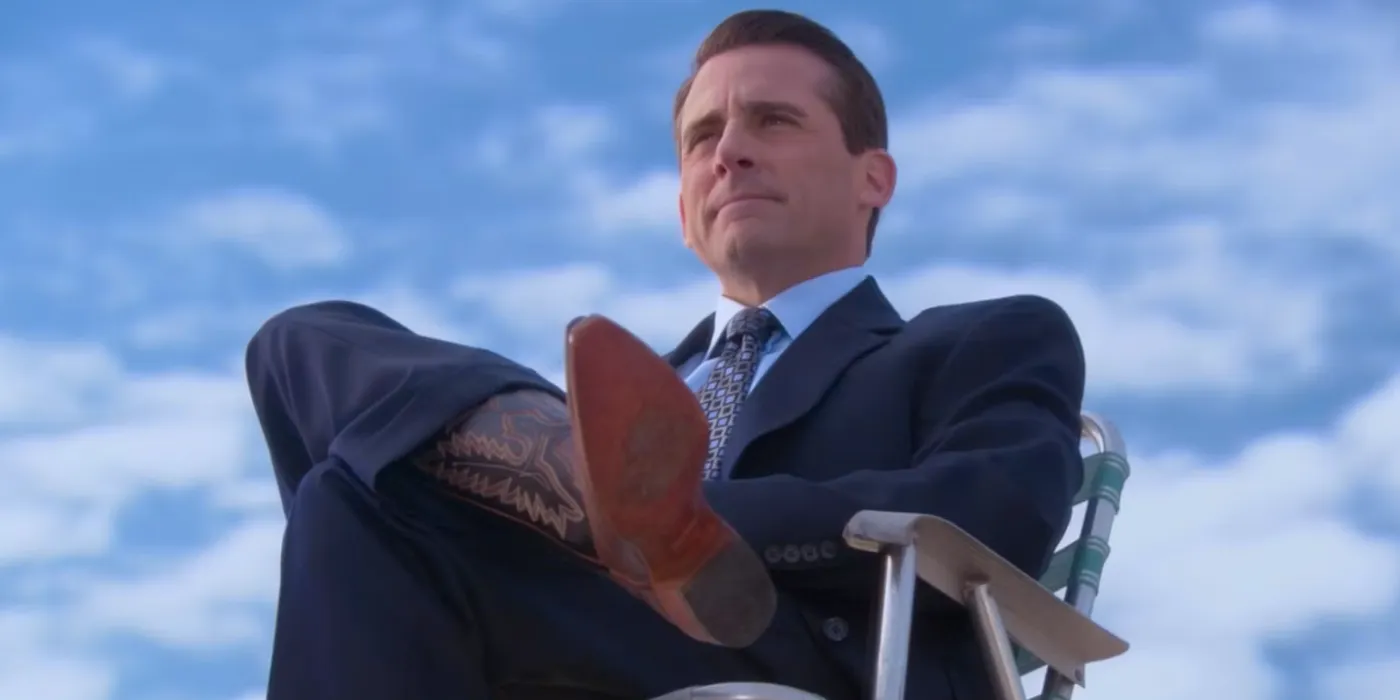 Michael wearing cowboy boots in The Office Image